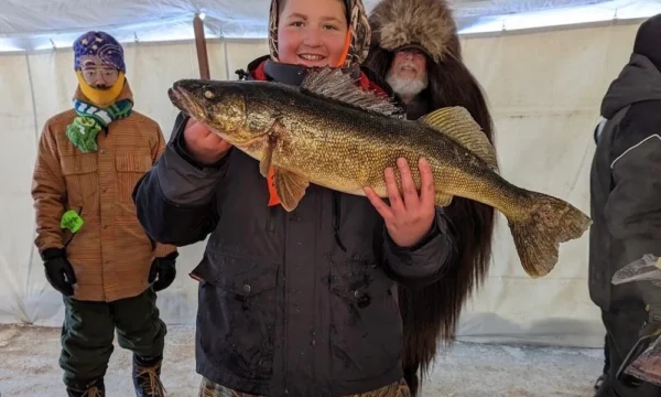 Minnesota Boy Lands Giant Walleye Wins Massive Ice-Fishing Tournament.